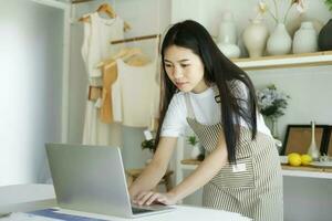 Enjoy young businesswoman contact with customers celebrate success or happy pose. photo