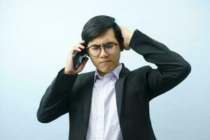 Portrait of businessman talking on phone. photo