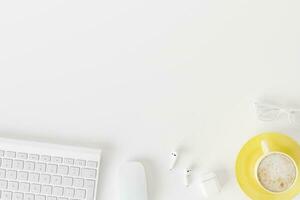 Topview of desktop white desk,working space,working background. photo