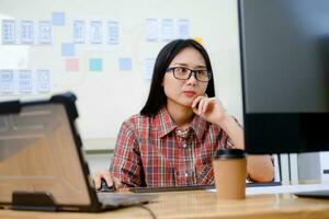 Programmers and developer teams are coding and developing software photo