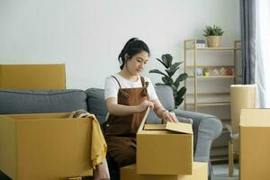 Modern female people in moving home apartment leisure indoor activity alone. photo