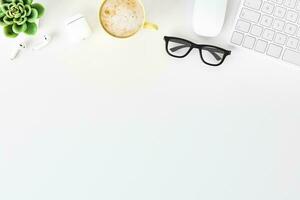 Topview of desktop white desk,working space,working background. photo