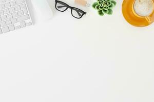 Topview of desktop white desk,working space,working background. photo