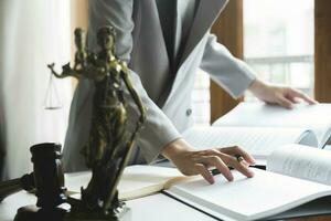 Business woman in suit or lawyer working on a documents. photo