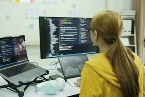 Programmer is coding and programming software. photo