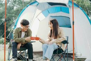 Happy couple camping life at park photo