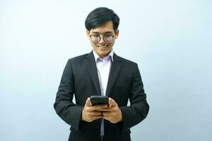 Portrait of businessman using smartphone. photo