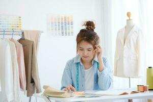 Fashion designer working in studio photo