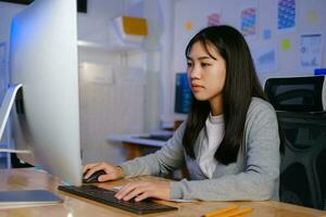 Programmers and developer teams are coding and developing software photo