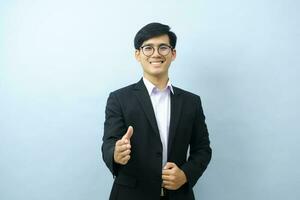 Portrait of businessman pointing at camera. photo