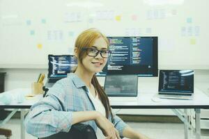 Programmer is coding and programming software. photo