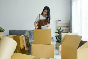Modern female people in moving home apartment leisure indoor activity alone. photo