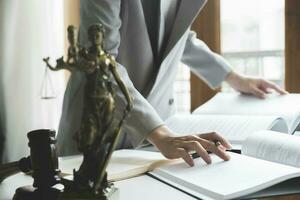 Business woman in suit or lawyer working on a documents. photo