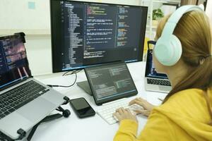 Programmer is coding and programming software. photo