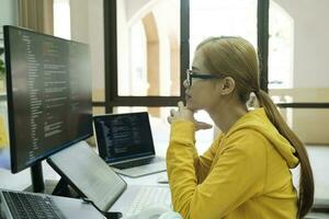 Programmer is coding and programming software. photo
