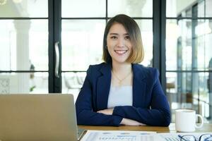 Confident asian businesswoman in office. photo