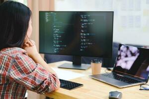 Programmers and developer teams are coding and developing software photo