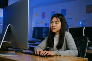 Programmers and developer teams are coding and developing software photo