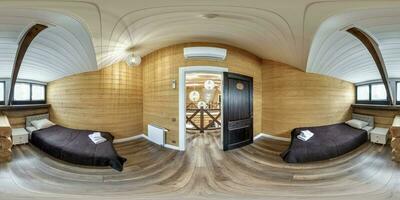 360 hdri panorama in interior of wooden eco bedroom in rustic style homestead on mansard floor with rafter ceiling in equirectangular projection with zenith and nadir. VR AR content photo