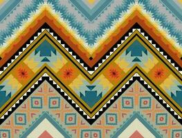 The geometric ethnic pattern of traditional style. Navajo, America Indian patterns. Design for background, wallpaper, clothing, wrapping, Batik, fabric, and prints. Vector illustration.