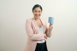 Asian woman with hand holding coffee cup photo