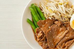 stir-fry Teriyaki Pork with sesame seeds ,mung bean sprouts, boiled egg and rice set photo