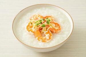 Congee with shrimps and fresh ginger photo