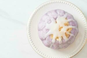 taro bun with white sugar cream and nut photo