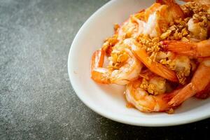 fried shrimps or prawns with garlic photo