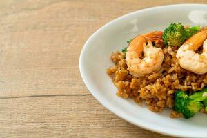 fried rice with broccoli and shrimps photo