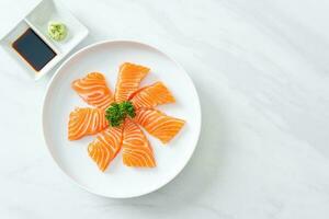 Fresh Salmon Raw Sashimi on plate photo