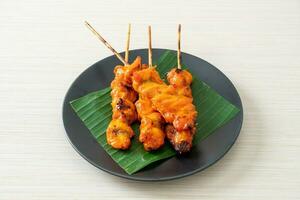 grilled chicken skewer in Asian style photo