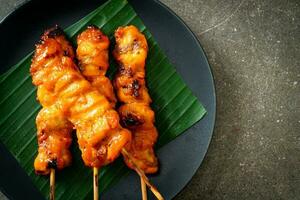 grilled chicken skewer in Asian style photo