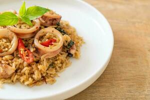 Basil and Spicy Herb Fried Rice with Squid or Octopus photo