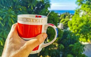 Norwegian coffee cup Norway coffee pot in tropical place. photo