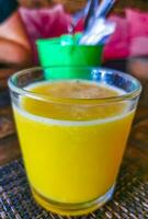 Orange fruit juice in restaurant PapaCharly Playa del Carmen Mexico. photo