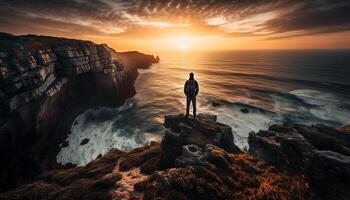 One man standing on cliff, enjoying solitude generated by AI photo