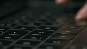 Macro close-up of female hands busy working on laptop or computer keyboard for send emails and surf on a web browser video