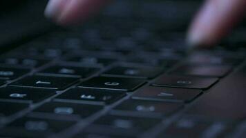 Macro close-up of female hands busy working on laptop or computer keyboard for send emails and surf on a web browser video