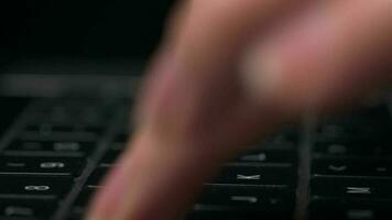 Macro close-up of female hands busy working on laptop or computer keyboard for send emails and surf on a web browser video