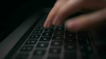 Macro close-up of female hands busy working on laptop or computer keyboard for send emails and surf on a web browser video