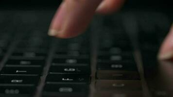 Macro close-up of female hands busy working on laptop or computer keyboard for send emails and surf on a web browser video