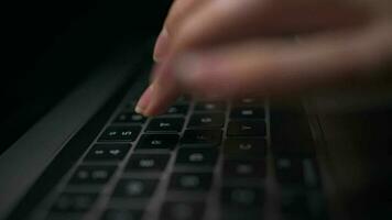 Macro close-up of female hands busy working on laptop or computer keyboard for send emails and surf on a web browser video