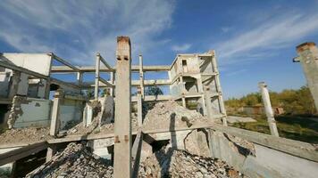 FPV drone flies quickly and agilely through an abandoned destroyed building. Post-apocalyptic location without people video