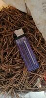 Object Photography - Gas lighter on a pile of twigs photo