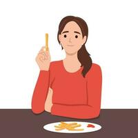 mujer come francés papas fritas sin pensando acerca de salud riesgos de rápido comida y frito meriendas. niña es teniendo almuerzo en café sentado a mesa con francés papas fritas y necesidades consulta con nutricionista vector