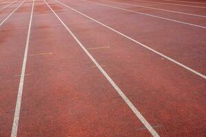 running track with white lines photo