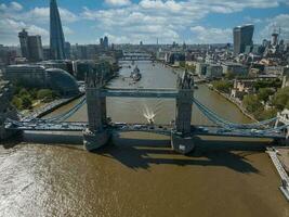 Iconic Tower Bridge connecting Londong with Southwark on the Thames River photo