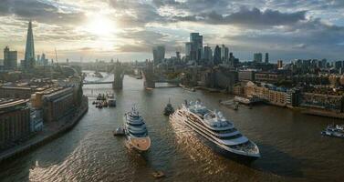 Large cruise ship going through London under the Tower Bridge. photo