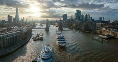 Large cruise ship going through London under the Tower Bridge. photo